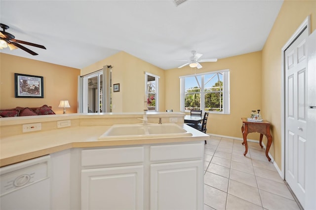 4004 Landor Ct, Venice, FL 34293 - kitchen with dishwasher, a ceiling fan, light tile patterned floors, and a sink