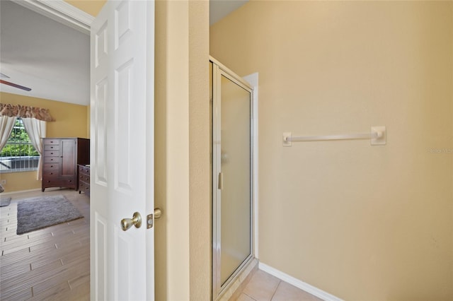 4004 Landor Ct, Venice, FL 34293 - bathroom with a shower stall, baseboards, and ceiling fan