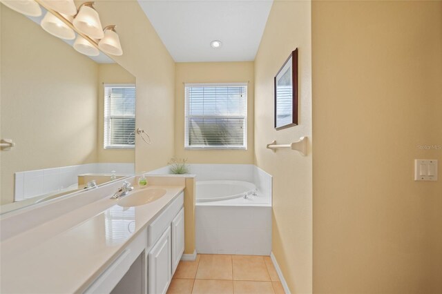 4004 Landor Ct, Venice, FL 34293 - full bath featuring baseboards, a bath, tile patterned floors, and vanity