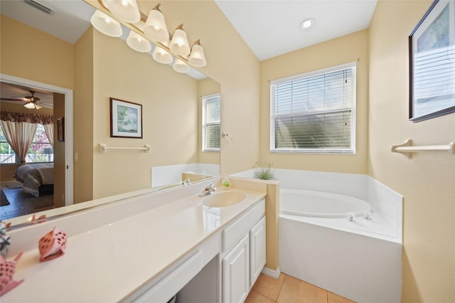 4004 Landor Ct, Venice, FL 34293 - full bathroom with tile patterned floors, vanity, visible vents, a garden tub, and ensuite bath