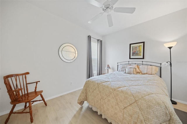 4004 Landor Ct, Venice, FL 34293 - bedroom with light wood-style flooring, a ceiling fan, and baseboards