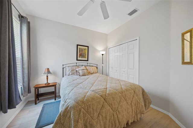 4004 Landor Ct, Venice, FL 34293 - bedroom with baseboards, light wood-style flooring, visible vents, and a closet