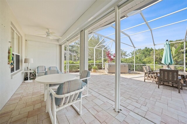 4004 Landor Ct, Venice, FL 34293 - sunroom with a jacuzzi, a ceiling fan, and outdoor dining area