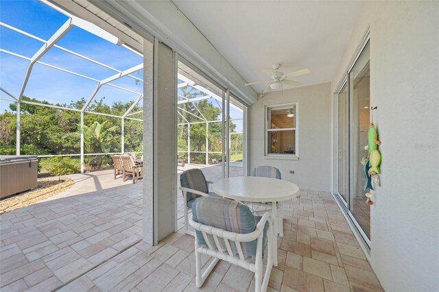 4004 Landor Ct, Venice, FL 34293 - sunroom / solarium with a jacuzzi, outdoor dining space, and a ceiling fan