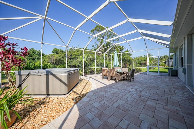 4004 Landor Ct, Venice, FL 34293 - view of patio with a lanai, a hot tub, and outdoor dining space