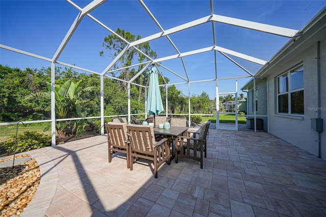4004 Landor Ct, Venice, FL 34293 - view of patio / terrace featuring glass enclosure and outdoor dining area