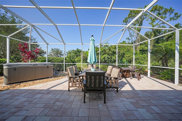 4004 Landor Ct, Venice, FL 34293 - view of patio / terrace with outdoor dining space, a lanai, and a hot tub