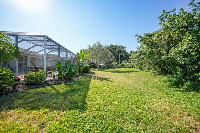 4004 Landor Ct, Venice, FL 34293 - view of yard with a lanai