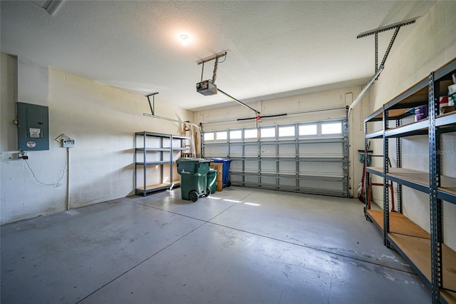 4004 Landor Ct, Venice, FL 34293 - garage featuring electric panel and a garage door opener