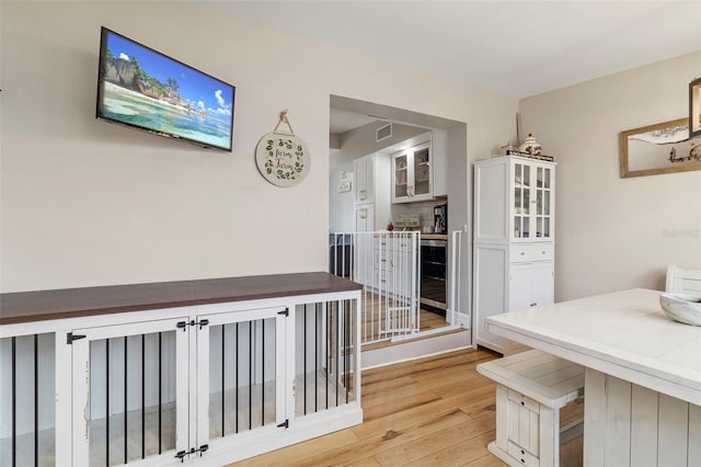 dining room with visible vents and light wood-style floors