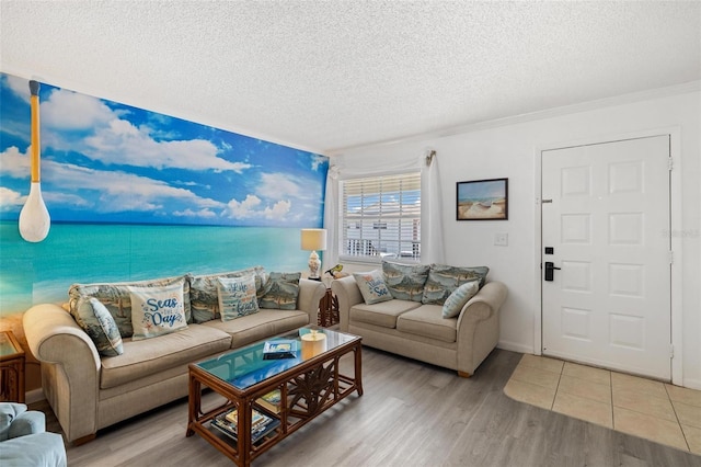 1531 Placida Rd Unit 201, Englewood, FL 34223 - living area with wood finished floors, a textured ceiling, and ornamental molding