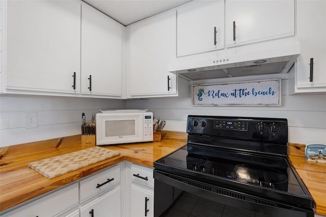 1531 Placida Rd Unit 201, Englewood, FL 34223 - kitchen featuring butcher block countertops, under cabinet range hood, white microwave, electric range, and white cabinetry