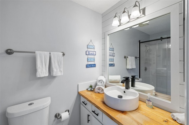 1531 Placida Rd Unit 201, Englewood, FL 34223 - bathroom with a shower stall, toilet, and vanity