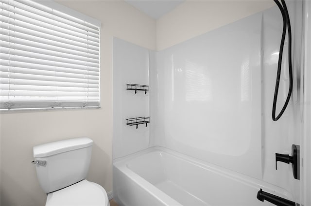 full bathroom featuring toilet and shower / tub combination