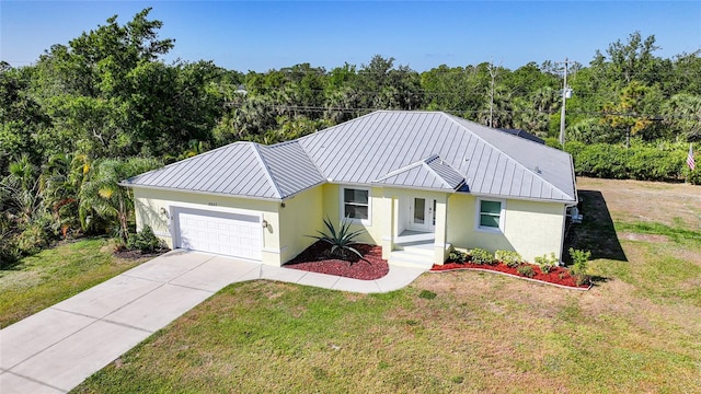 2957 Montgomery Dr, Port Charlotte, FL 33981 - ranch-style home with a garage, a front lawn, stucco siding, and a standing seam roof