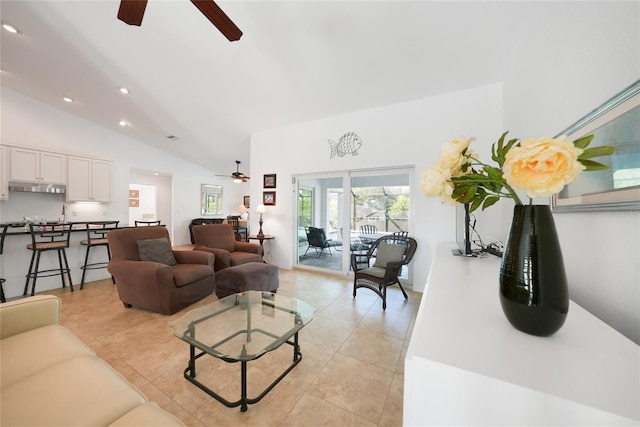 2957 Montgomery Dr, Port Charlotte, FL 33981 - living room featuring vaulted ceiling, light tile patterned floors, a ceiling fan, and recessed lighting