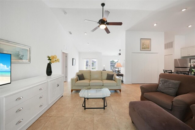 2957 Montgomery Dr, Port Charlotte, FL 33981 - living room featuring visible vents, light tile patterned flooring, ceiling fan, high vaulted ceiling, and recessed lighting