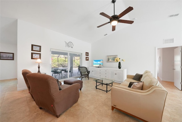 2957 Montgomery Dr, Port Charlotte, FL 33981 - living area with light tile patterned flooring, high vaulted ceiling, visible vents, and ceiling fan