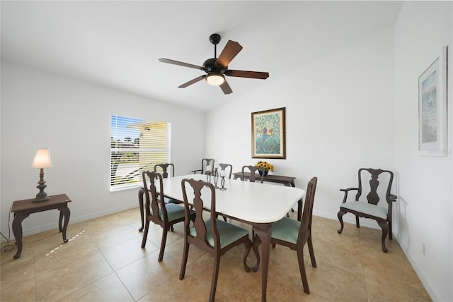 2957 Montgomery Dr, Port Charlotte, FL 33981 - dining area featuring baseboards, a ceiling fan, light tile patterned flooring, and vaulted ceiling