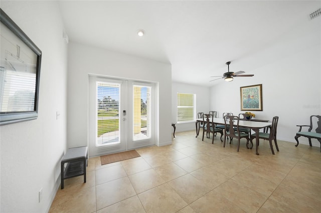 2957 Montgomery Dr, Port Charlotte, FL 33981 - dining room with french doors, a ceiling fan, baseboards, and light tile patterned floors