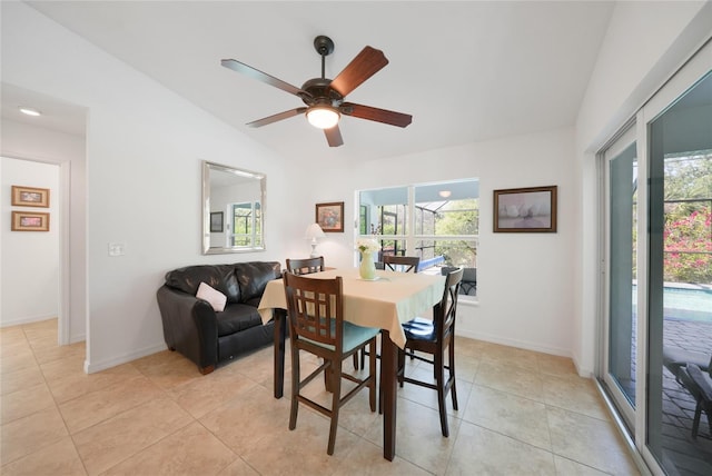 2957 Montgomery Dr, Port Charlotte, FL 33981 - dining space featuring light tile patterned flooring, ceiling fan, baseboards, and lofted ceiling