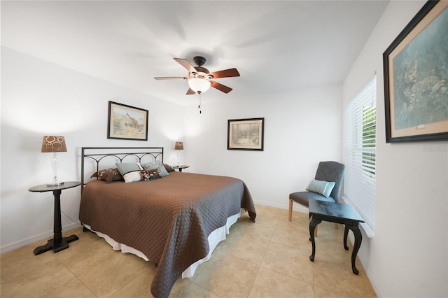 2957 Montgomery Dr, Port Charlotte, FL 33981 - bedroom featuring light tile patterned floors, baseboards, and a ceiling fan