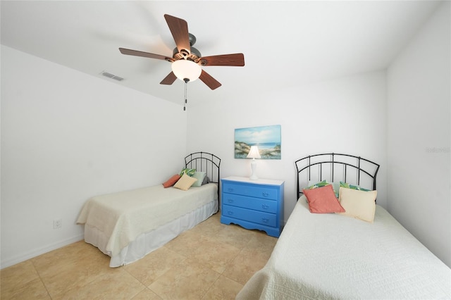 2957 Montgomery Dr, Port Charlotte, FL 33981 - bedroom with visible vents, ceiling fan, and light tile patterned floors