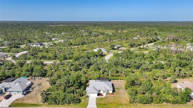 2957 Montgomery Dr, Port Charlotte, FL 33981 - aerial view featuring a residential view and a forest view