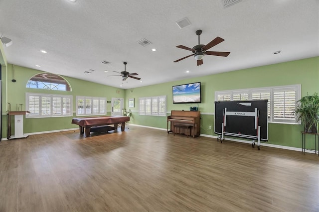 recreation room with visible vents, billiards, wood finished floors, and a wealth of natural light