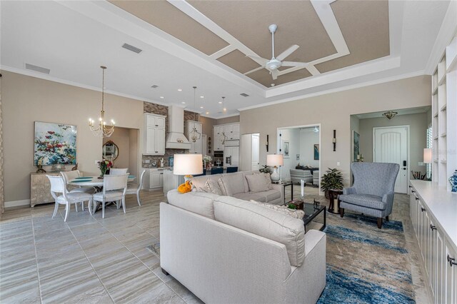living area featuring a ceiling fan, ornamental molding, light tile patterned floors, a chandelier, and recessed lighting