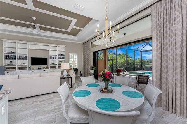 dining area with ceiling fan, ornamental molding, a chandelier, and a sunroom