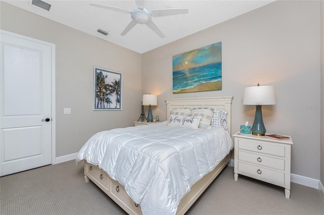 carpeted bedroom with baseboards and ceiling fan