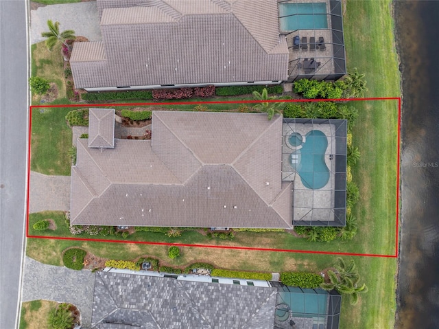 view of property location with a pool and property parcel outlined
