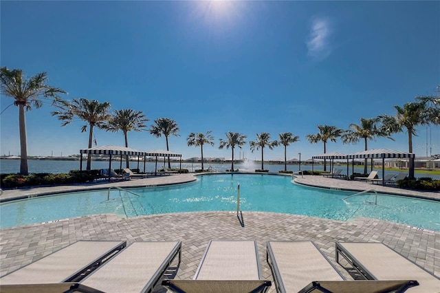 community pool with a gazebo