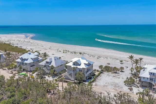6890 Palm Island Dr, Placida, FL 33946 - birds eye view of property featuring a beach view and a water view