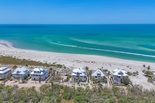 6890 Palm Island Dr, Placida, FL 33946 - birds eye view of property featuring a beach view and a water view