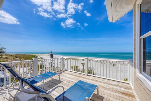 6890 Palm Island Dr, Placida, FL 33946 - wooden deck with a beach view and a water view