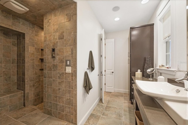 6890 Palm Island Dr, Placida, FL 33946 - bathroom with a walk in shower, vanity, and baseboards