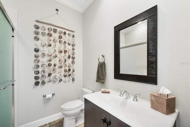 6890 Palm Island Dr, Placida, FL 33946 - bathroom featuring ornamental molding, toilet, vanity, and baseboards