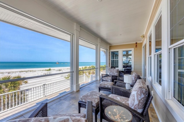 6890 Palm Island Dr, Placida, FL 33946 - sunroom with a beach view and a water view