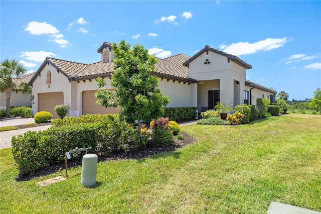11125 Mcdermott Ct, Englewood, FL 34223 - mediterranean / spanish-style home featuring stucco siding, a tile roof, a front lawn, and a garage