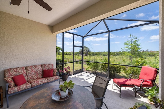 11125 Mcdermott Ct, Englewood, FL 34223 - sunroom with a ceiling fan