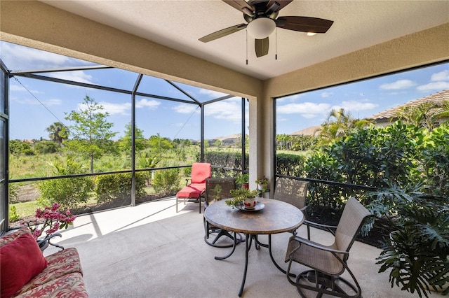 11125 Mcdermott Ct, Englewood, FL 34223 - sunroom featuring ceiling fan