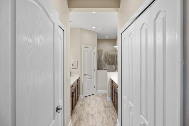 11125 Mcdermott Ct, Englewood, FL 34223 - full bath featuring recessed lighting, a tile shower, wood finished floors, and vanity