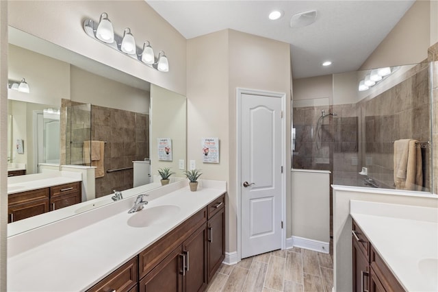 11125 Mcdermott Ct, Englewood, FL 34223 - full bathroom featuring a sink, a walk in shower, and two vanities