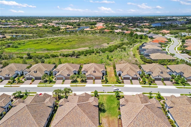 11125 Mcdermott Ct, Englewood, FL 34223 - drone / aerial view featuring a residential view and a water view