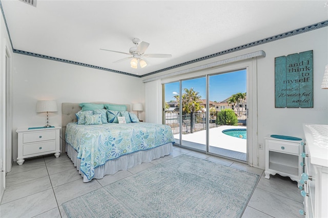 bedroom featuring a ceiling fan, light tile patterned flooring, and access to exterior