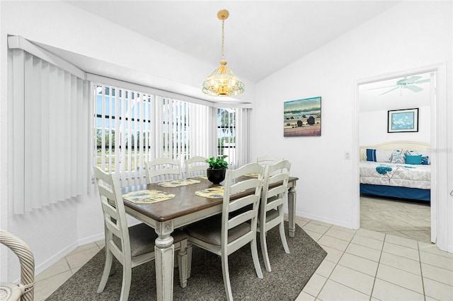 162 Fairway Rd, Rotonda West, FL 33947 - dining space featuring baseboards, light tile patterned floors, lofted ceiling, and a notable chandelier