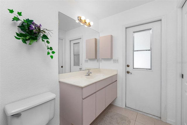 162 Fairway Rd, Rotonda West, FL 33947 - bathroom featuring vanity, tile patterned floors, and toilet
