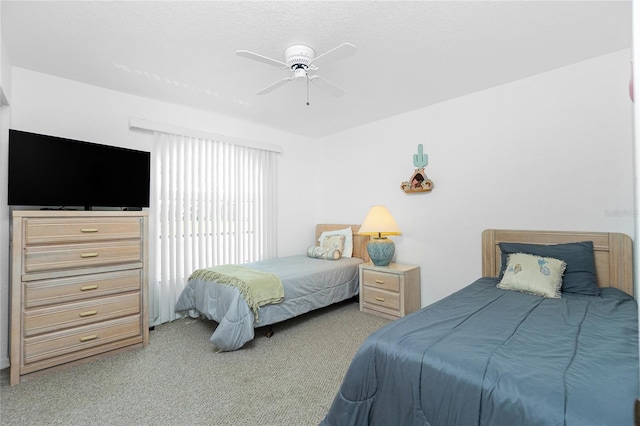 162 Fairway Rd, Rotonda West, FL 33947 - bedroom featuring ceiling fan and carpet